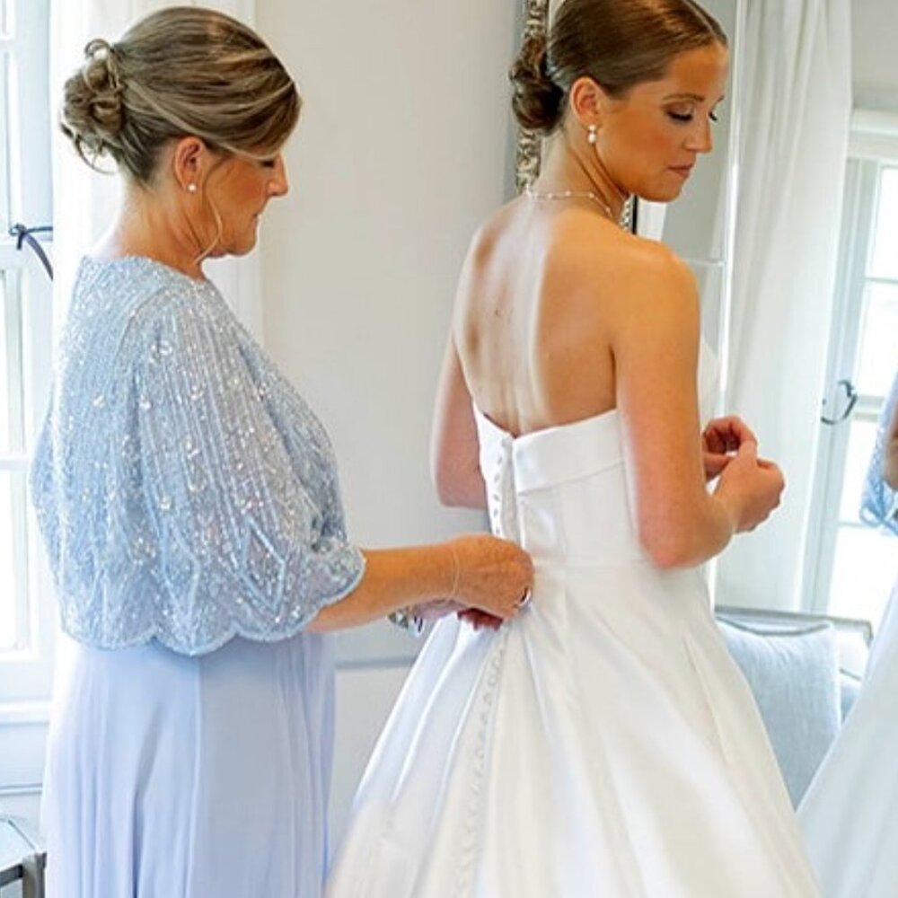 An Elegant Beaded Overlay A-Line Gown by Mac Duggal in Powder Blue